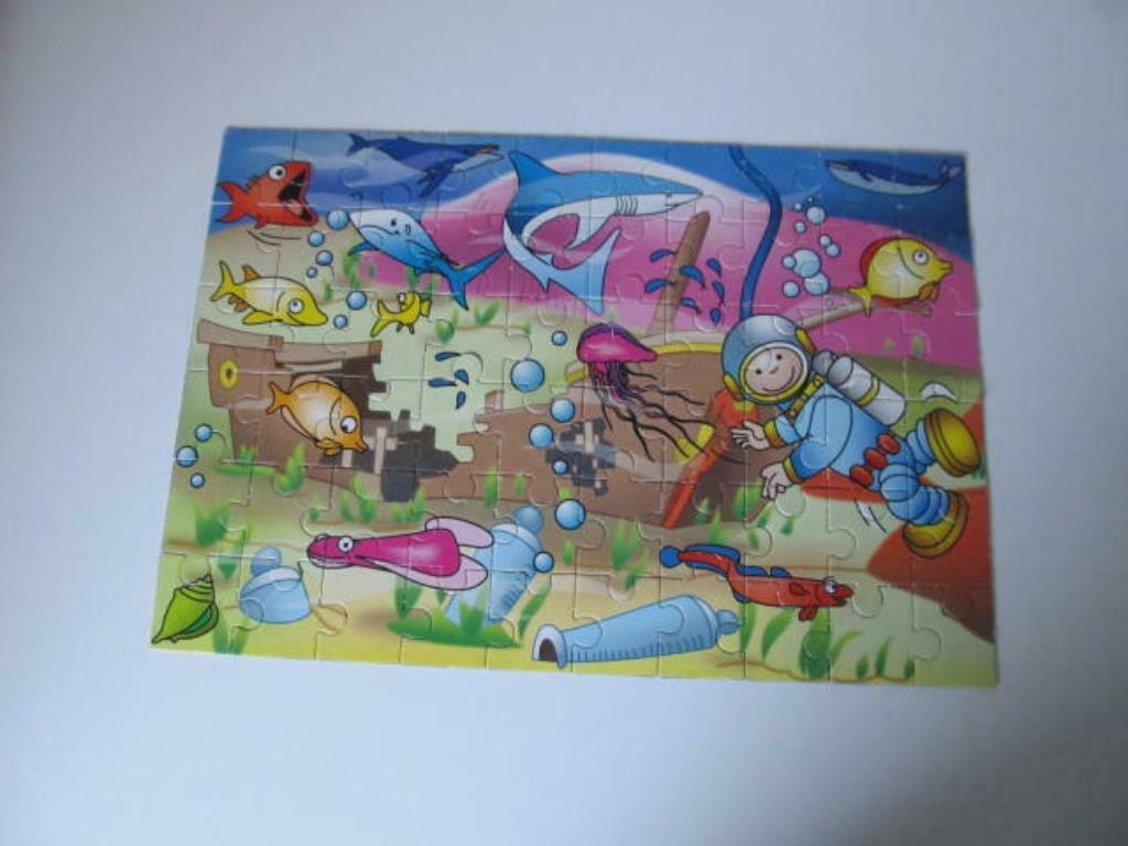 Puzzel Duiker onder water 60 stukjes, Enlèvement ou Envoi, Plus de 50 pièces, Comme neuf, 2 à 4 ans