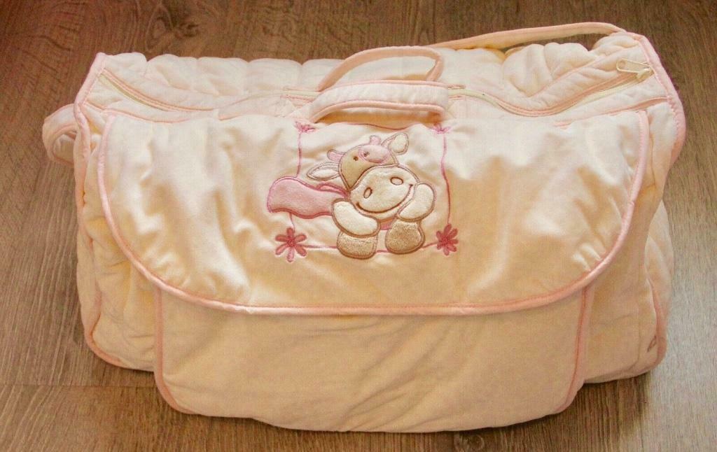 Sac de transport bébé de marque Noukie's "Lola la vache" neu, Enfants & Bébés, Enlèvement ou Envoi, Comme neuf