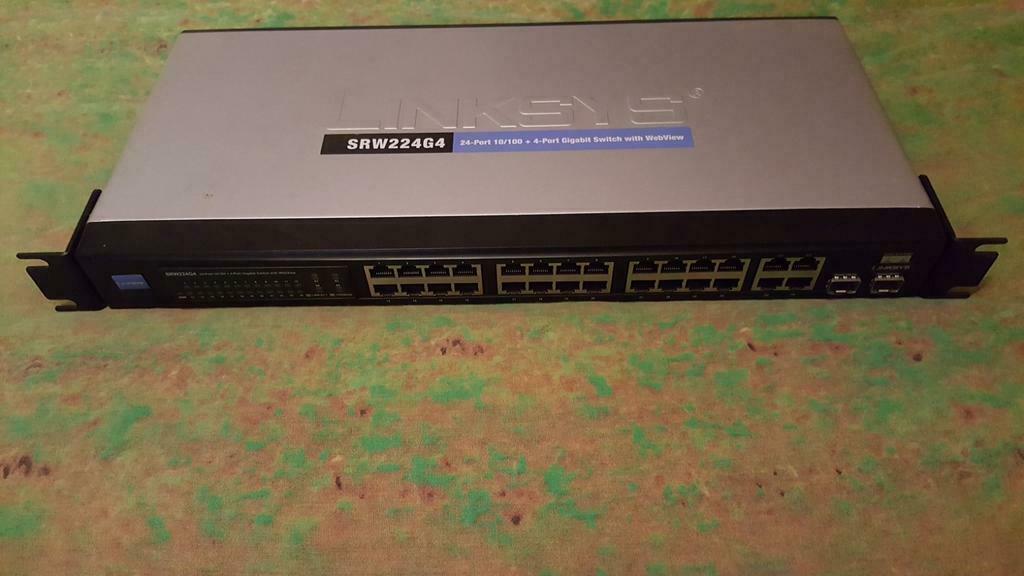 LINKSYS SRW224G4 24-PORT 10/100 4-PORT GIGABIT SWITCH WITH W, Computers en Software, Ophalen of Verzenden, Gebruikt