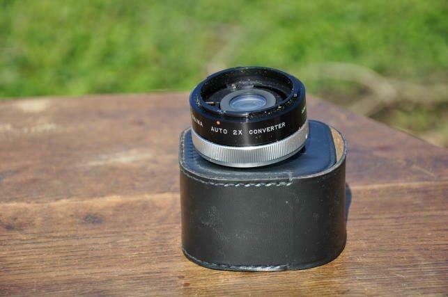 tokina auto 2x converter + housse, Enlèvement ou Envoi, Utilisé, Objectif grand angle