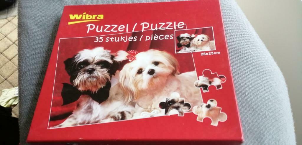 Puzzel van hondjes, Ophalen, 10 tot 50 stukjes, Zo goed als nieuw, 2 tot 4 jaar