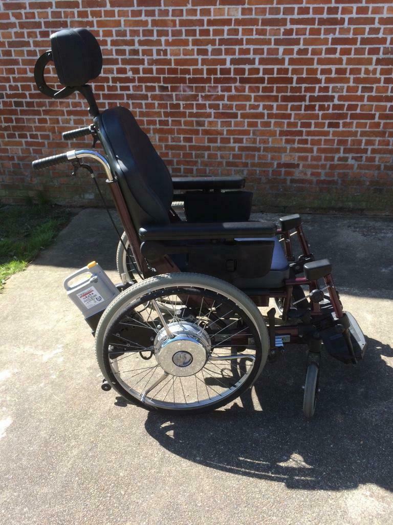 Manuele rolstoel met hulpmotor in de wielen, Ophalen of Verzenden, Zo goed als nieuw