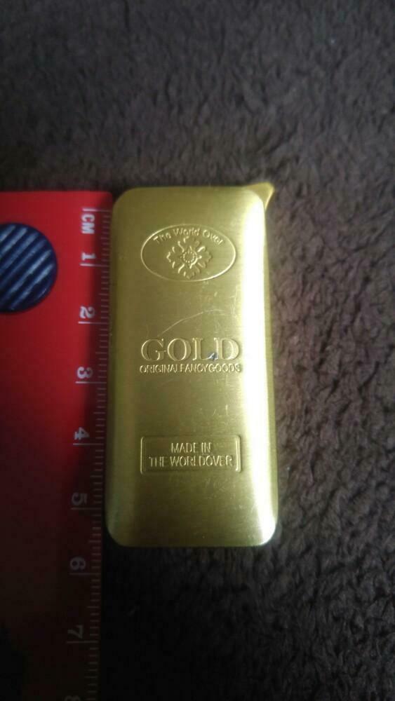 Briquet aansteker doré lingot or champ the world over, Ophalen of Verzenden, Zo goed als nieuw