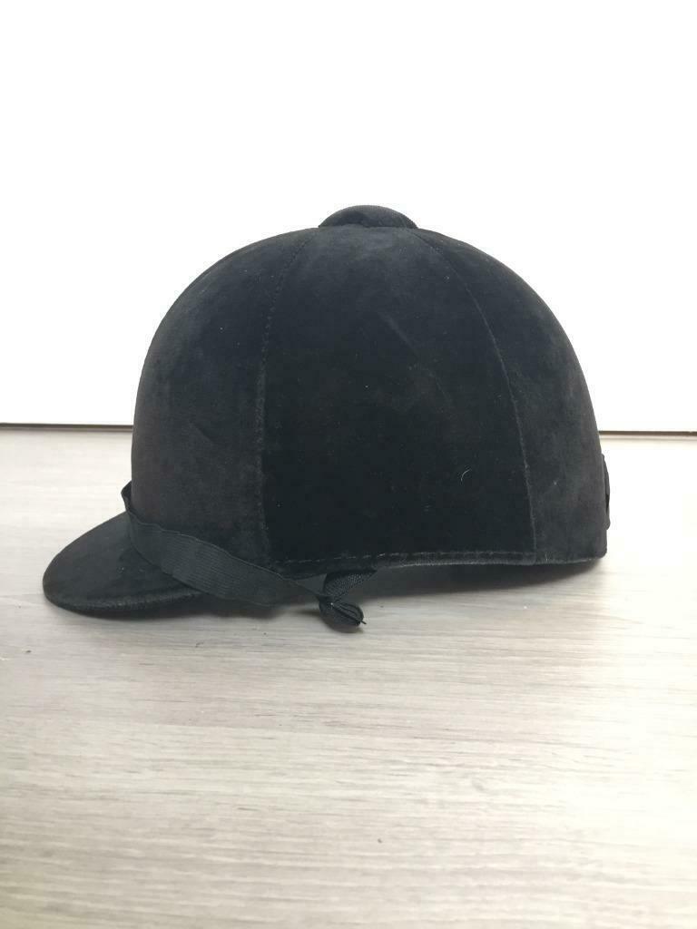 Helm voor paardrijden, Ophalen, Gebruikt, Cap
