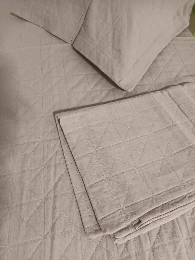 Bedsprei met kussenslopen, Ophalen