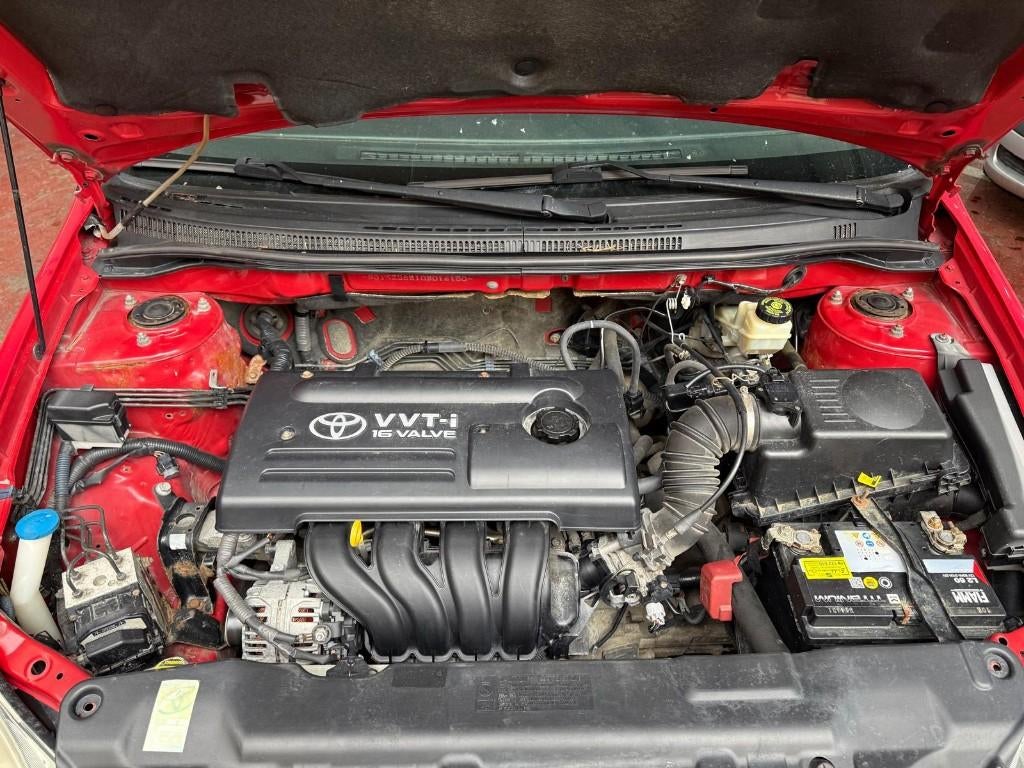 TOYOTA COROLLA DROGBA 115, Autos, Rouge, Boîte manuelle, Corolla, Noir