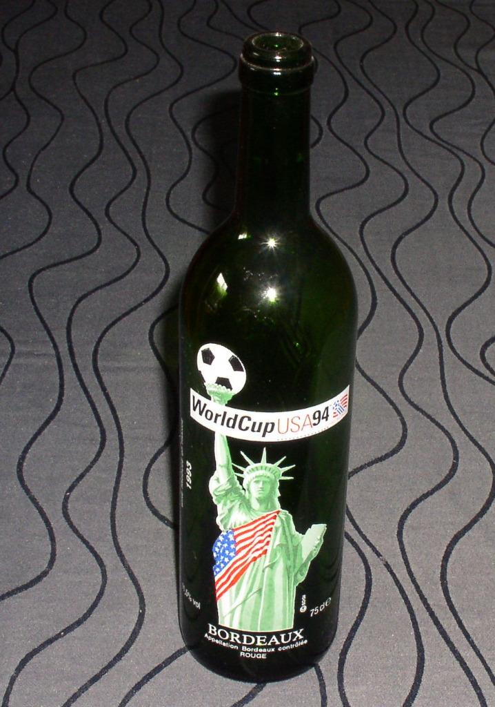 Wijnfles (leeg) WorldCup USA94 voetbal, Collections, Vins, Utilisé, Vin rouge, France, Enlèvement ou Envoi