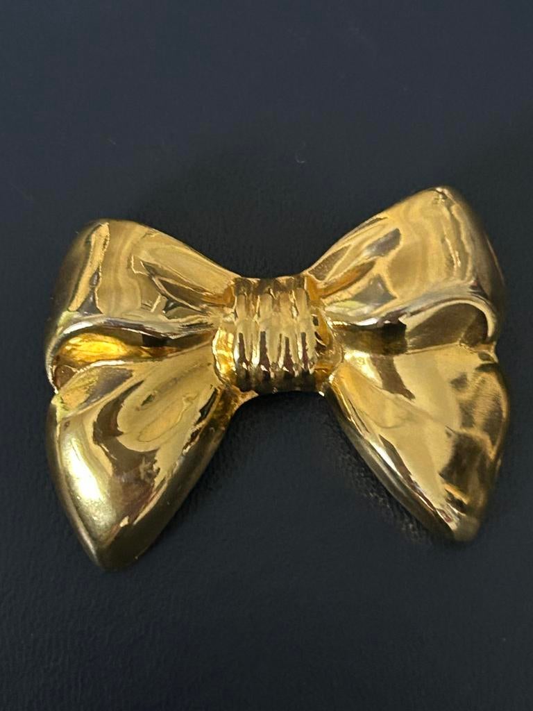 Broche Parfums Grès Paris noeud metal doré vintage, Enlèvement ou Envoi, Comme neuf