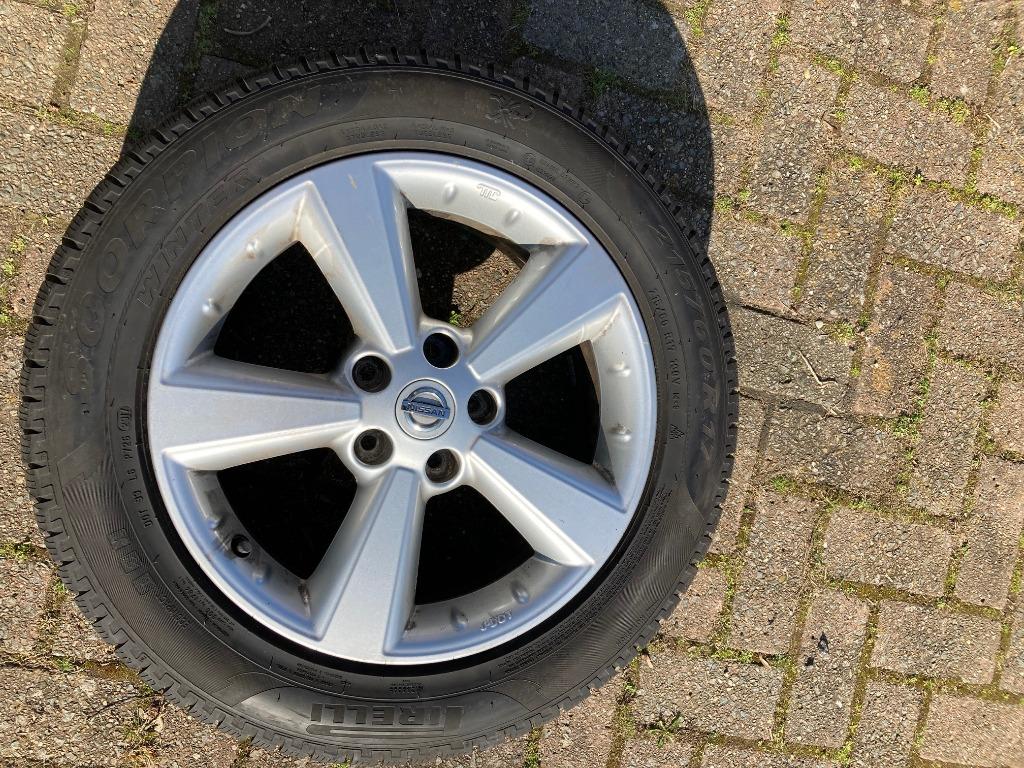 4 jantes en aluminium argenté (NISSAN) avec pneus d'hiver, Enlèvement