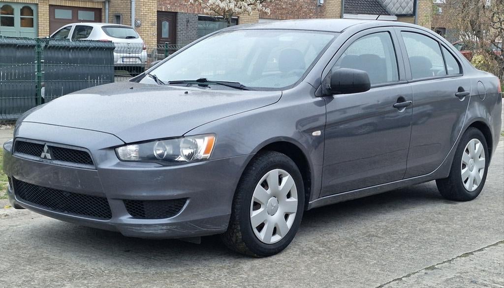 Mitsubishi lancer 1.5 benzine 2008 57.000km, Auto's, Mitsubishi, Voorwielaandrijving, Stof, Zwart, Particulier