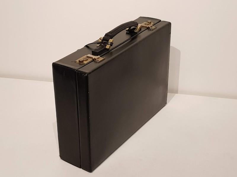 Mallette Delvaux/cuir noir., Bijoux, Sacs & Beauté, Valises, Enlèvement, Utilisé, Clé