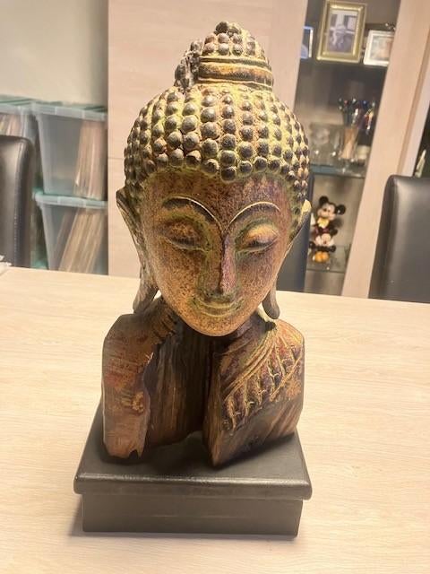 Boeddha beeld in teak, Enlèvement