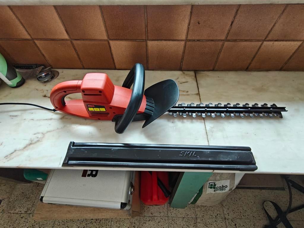 Skil heggenschaar, Ophalen