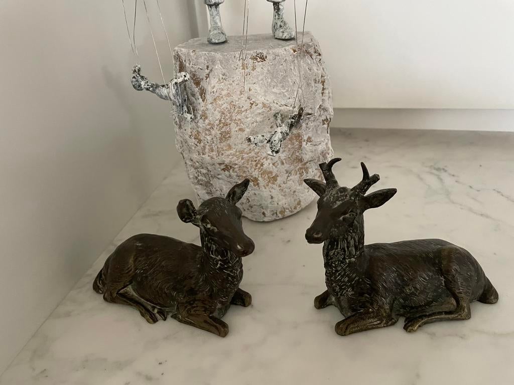 2 bronzen herten, Ophalen