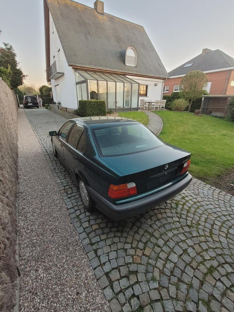 Bmw e36 316i  77 dkm !, Auto's, Stof, Zwart, 1600 cc, Handgeschakeld