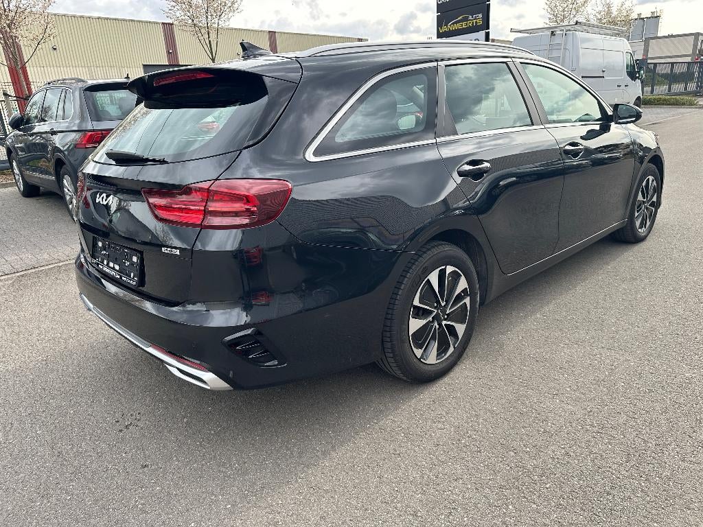 Kia Ceed SW 1.6 benz. +elektr. plug-in hybr, CARPLAY/ CAMERA, Auto's, Kia, Stof, Euro 6, USB, Zwart