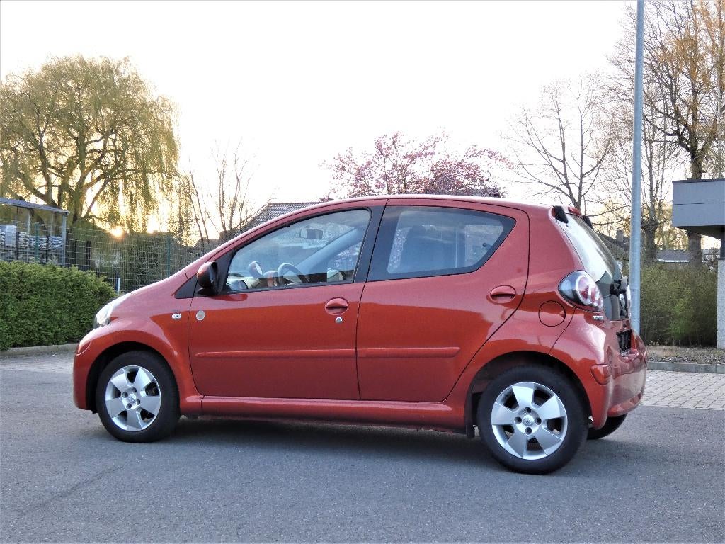 Toyota Aygo 1.0 VTT-i Orange Spice Airco !, Auto's, Toyota, Voorwielaandrijving, Euro 5, Stof, Overige kleuren