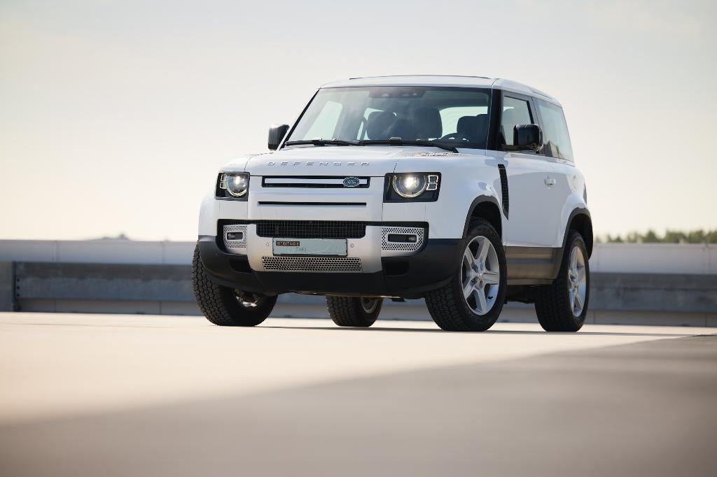 Land Rover Defender 90 D200 AWD SE, Auto's, Automaat, Zwart, Wit, Leder