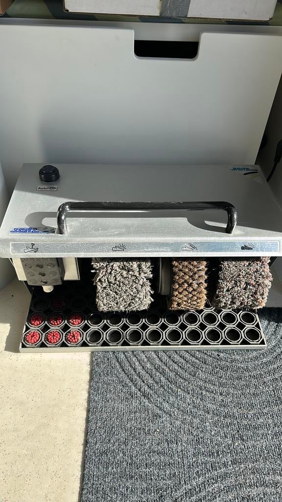 Schoenpoets machine, Ophalen