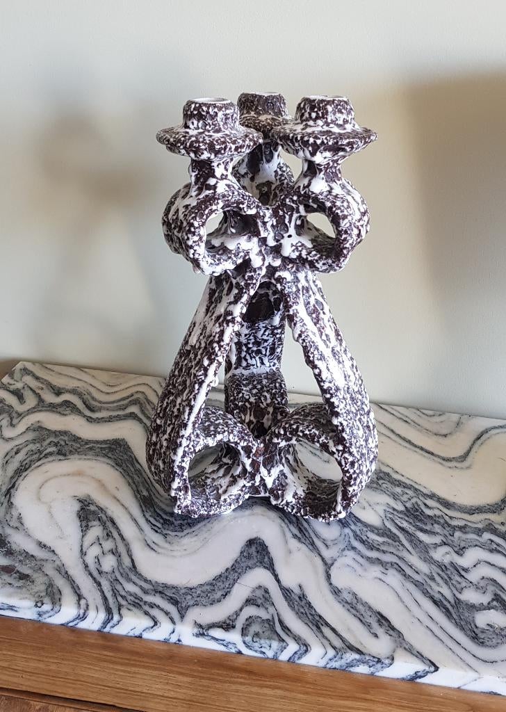 Keramische kandelaar, Ophalen