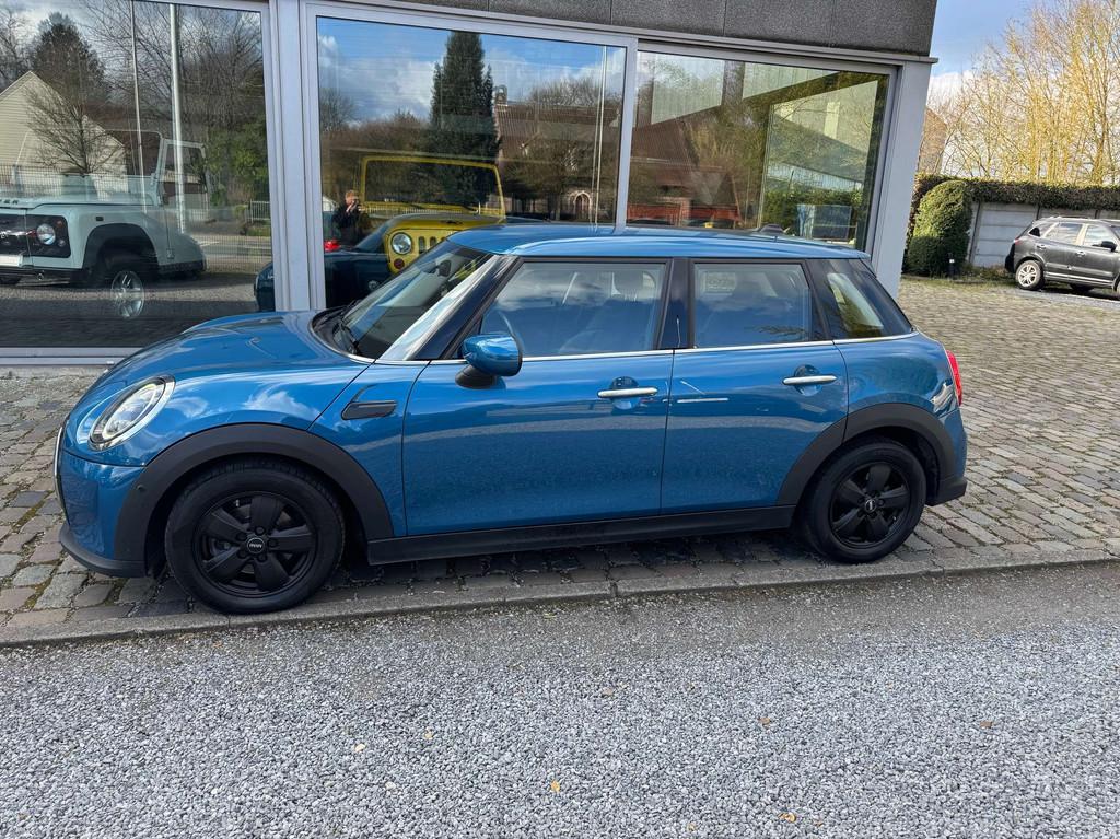 MINI One 1.5A OPF DCT (15.909 + BTW) (bj 2022, automaat), Auto's, Mini, 75 kW, Gebruikt, Blauw, Leder