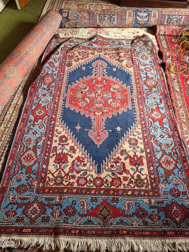 Heriz tapijt (iran), Ophalen