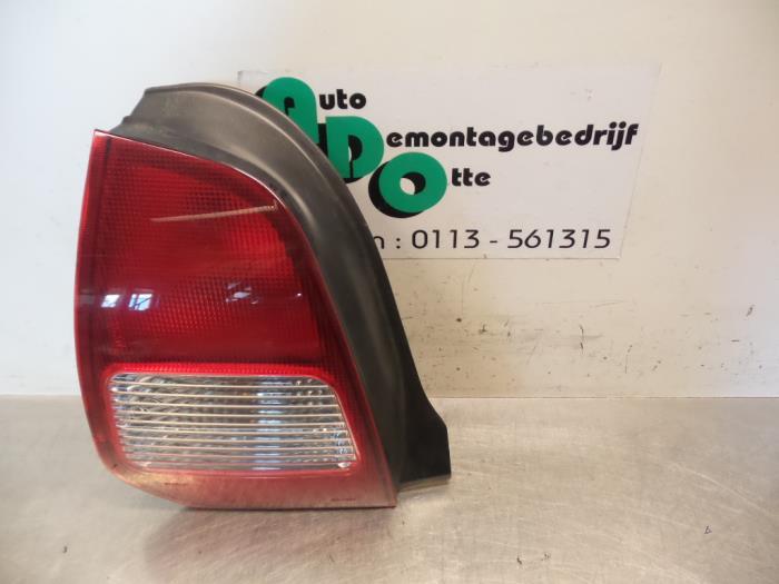 Feu arrière gauche d'un Mitsubishi Colt (Colt 00-), -, 3 mois de garantie, Utilisé, Mitsubishi