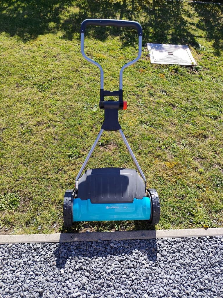 hand grasmaaier, Ophalen