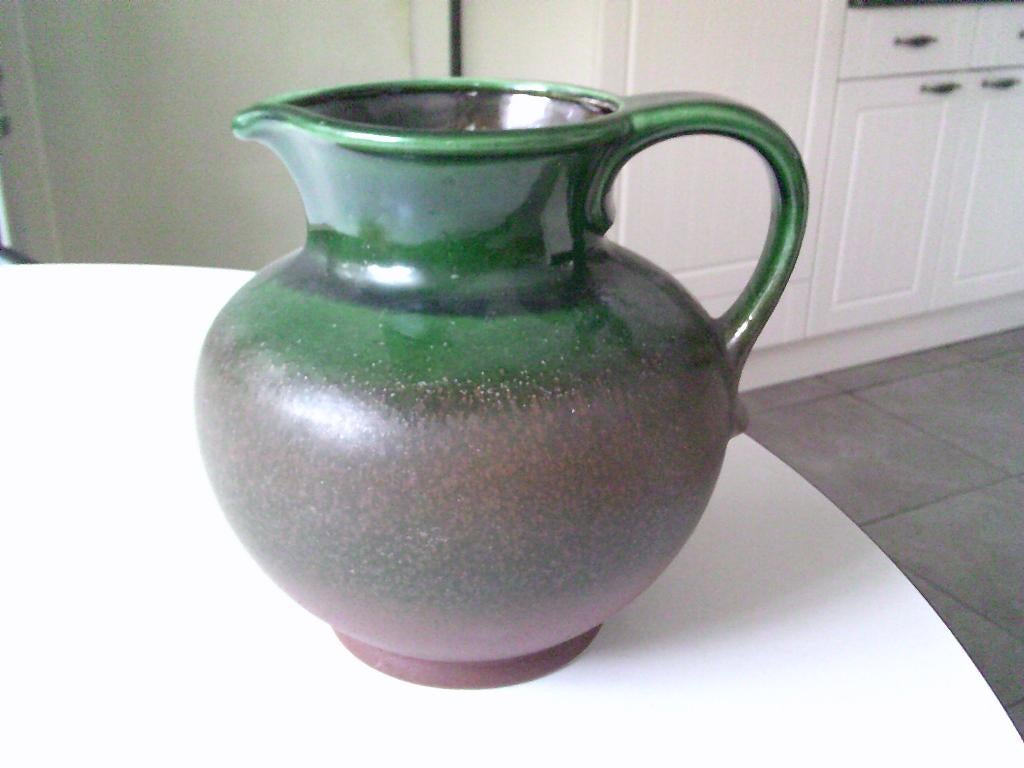 schenkkan in aardewerk, Ophalen