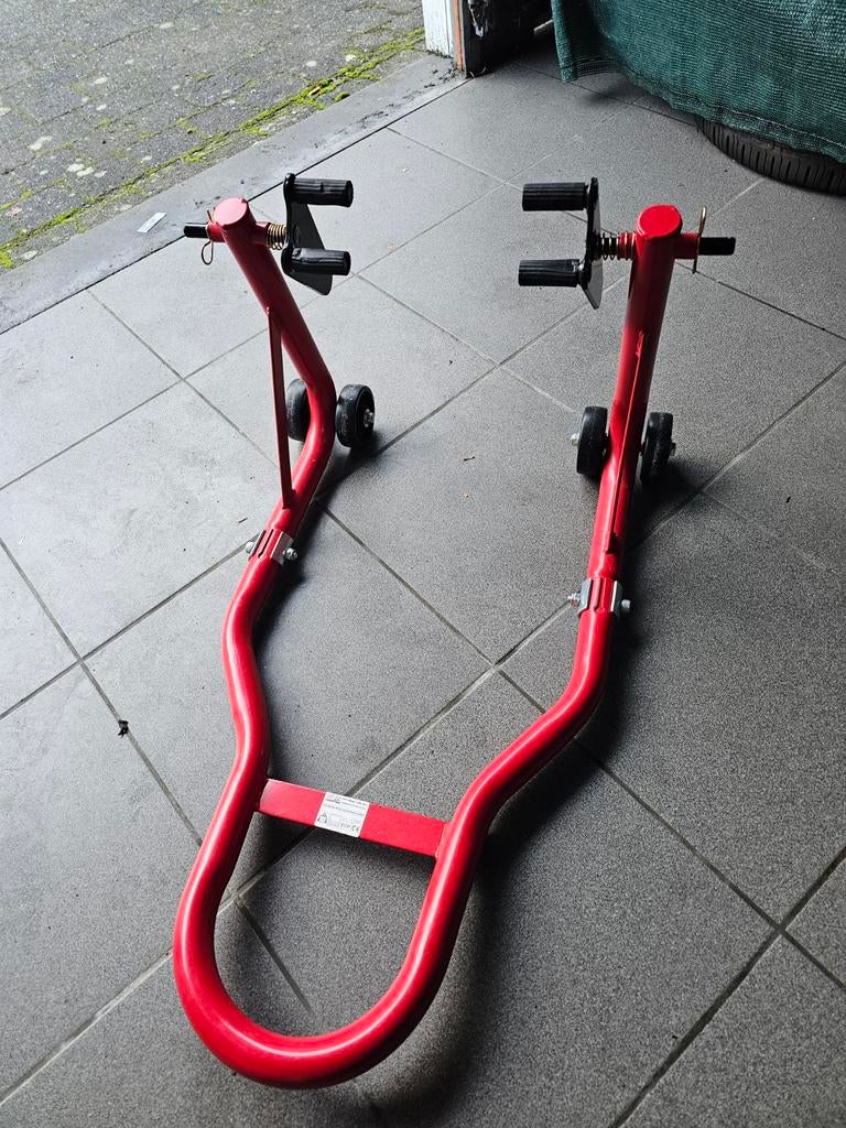 Paddocksteun motoren, Ophalen