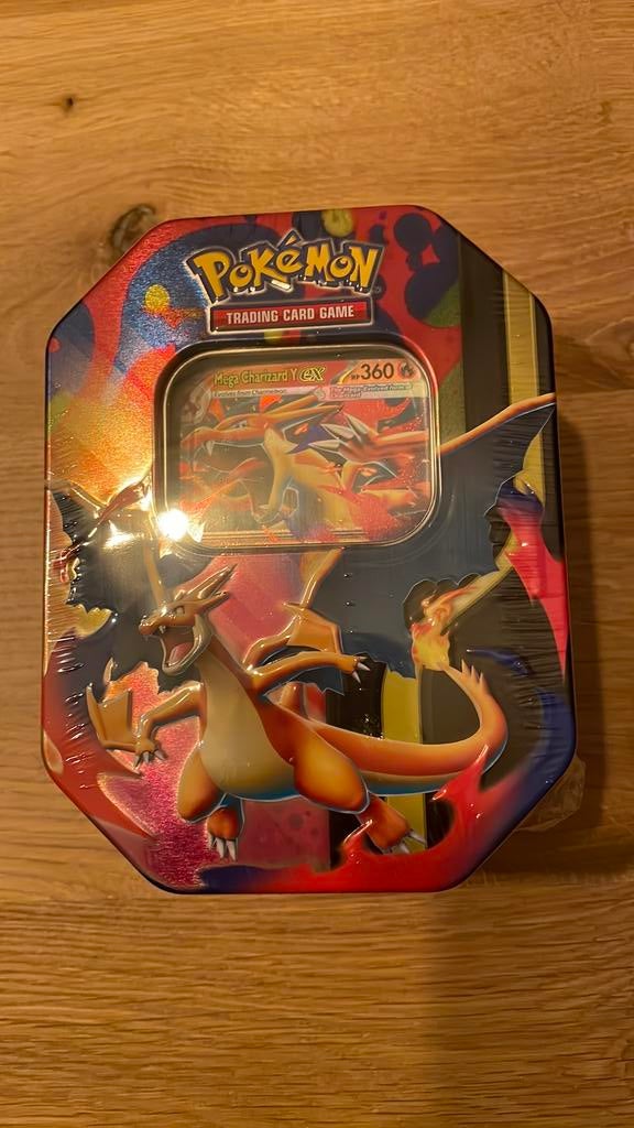 Pokémon TCG - Pokémon Tin box Mega Charizard x/y, Ophalen, Nieuw