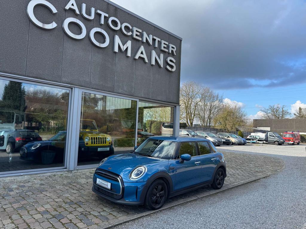 MINI One 1.5A OPF DCT (15.909 + BTW) (bj 2022, automaat), Auto's, Mini, 75 kW, Gebruikt, Blauw, Leder