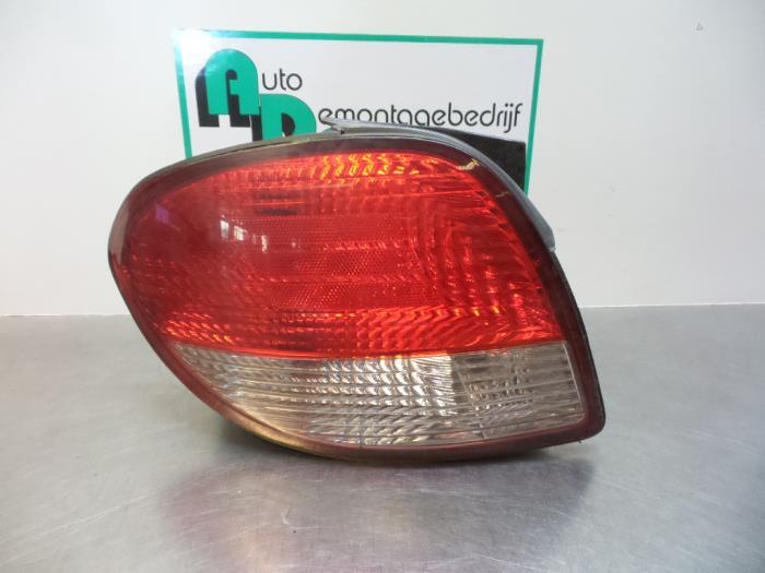 Feu arrière gauche d'un Hyundai Coupe (Coupe 96-), -, 3 mois de garantie, Utilisé, Hyundai