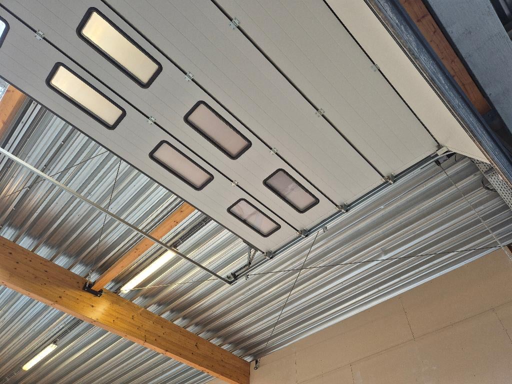 Porte sectionnelle avec porte intégrée, Enlèvement, Utilisé