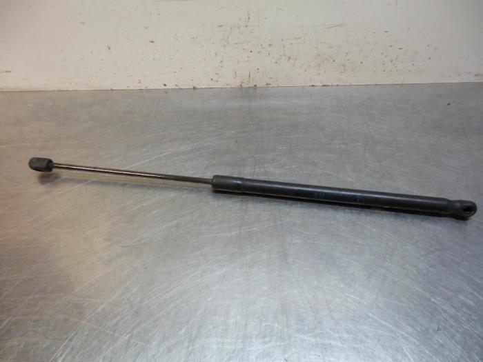 Amortisseur capot moteur gauche d'un Opel Astra (Astra H 04-, -, Opel, 3 mois de garantie, Utilisé