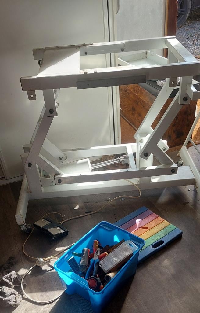 verstelbare tafel, Ophalen