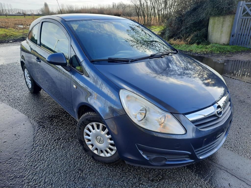 Opel Corsa 1200cc 2009 met slechts 119.000 km's, Auto's, Opel, Voorwielaandrijving, 4 cilinders, Bedrijf, Zilver of Grijs