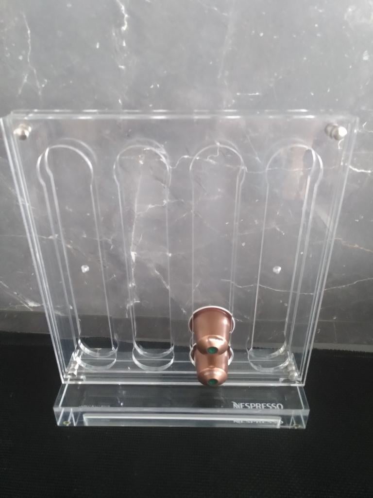 Nespresso capsulehouder, Ophalen