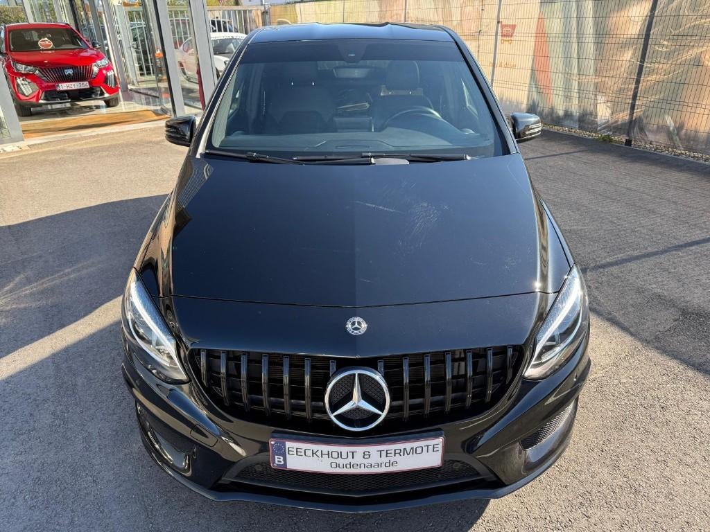 Mercedes-Benz B180 AMG-Line 7G-DCT // 12m garantie, 170 g/km, 4 cilinders, Zwart, 1595 cc