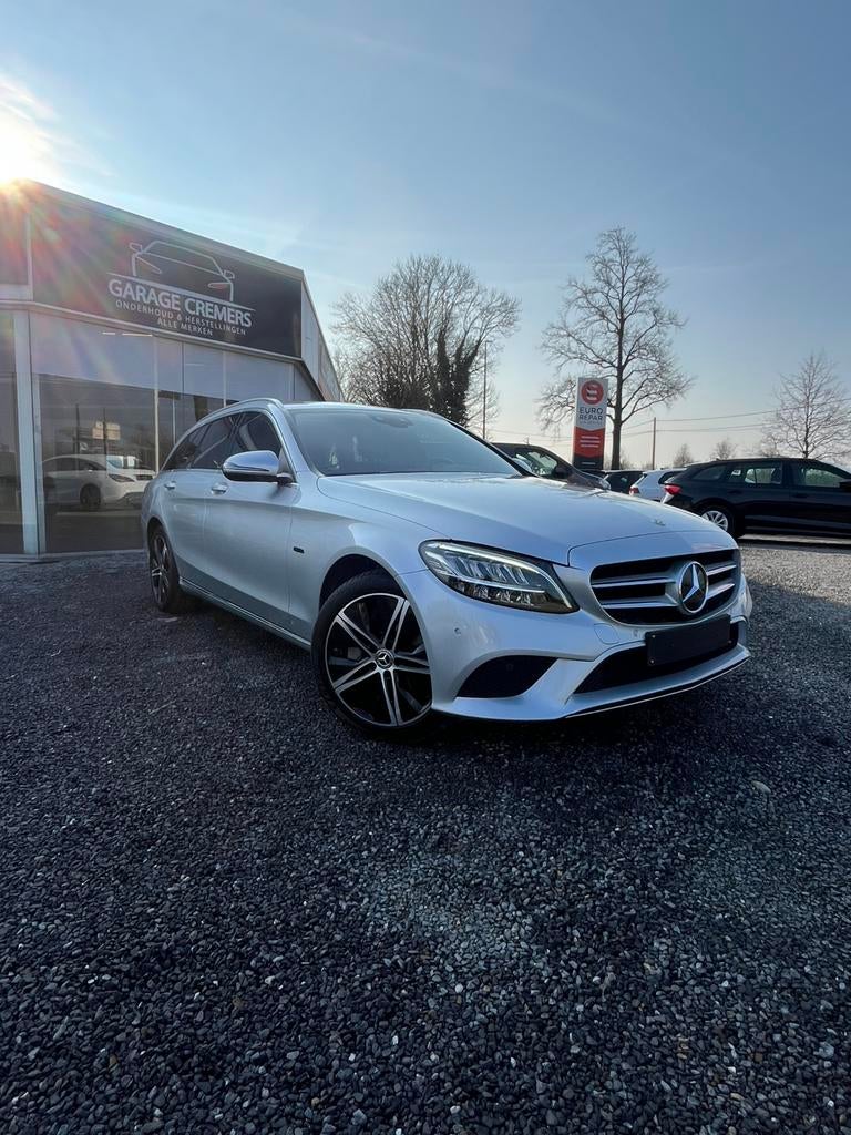 1 JAAR GARANTIE Mercedes C300de  PHEV 143kw T-9 Tronic Braek, Auto's, Automaat, Achterwielaandrijving, 4 cilinders, Leder en Stof