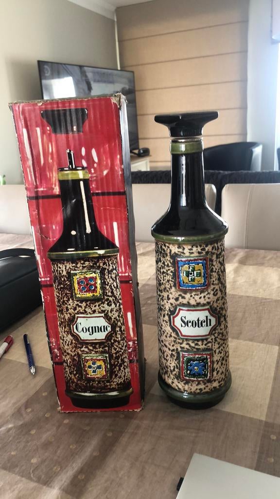 Fles in steen voor sterke drank, Ophalen