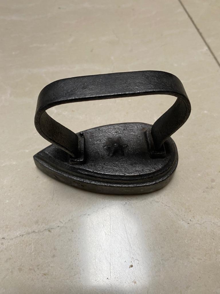 Antiek kinder strijkijzer, Ophalen