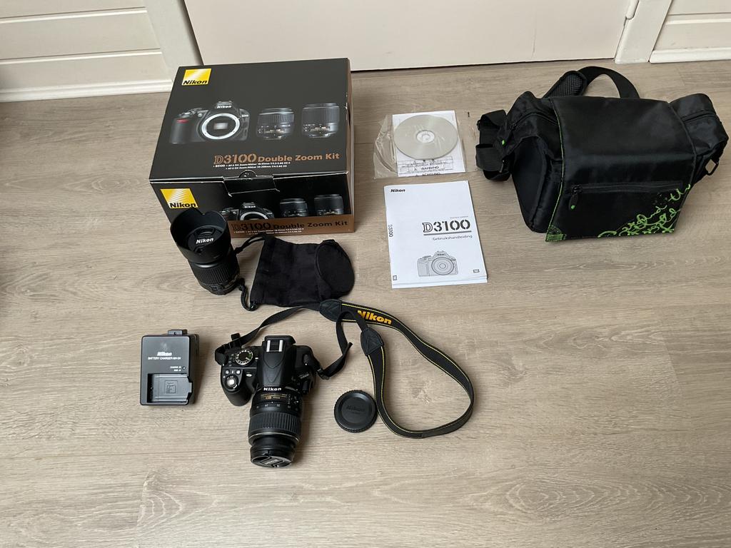 NIKON D3100 Camera met 2 lenzen (als nieuw), Ophalen of Verzenden, Zo goed als nieuw, Nikon