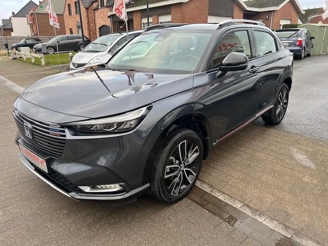 HONDA HR-V 1.5i e-HEV Hybrid Advance Style amper 12000km!!, Leder, 5 zetels, 5 deurs, Hybride Elektrisch/Benzine