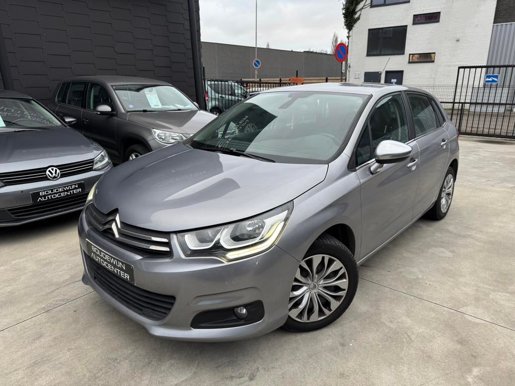 Citroën C4 1.2Benzine 2016 142.xxxkm/Airco,Navigatie,Cruise, Auto's, Voorwielaandrijving, https://public.car-pass.be/vhr/542eaf63-34c2-43c0-a432-ec9d9145309c