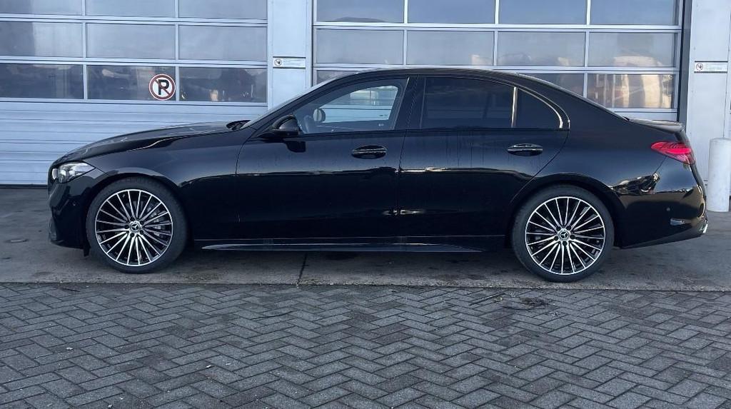 Mercedes-Benz C-Klasse 200 Berline 4MATIC AMG Line | Head-Up, Auto's, 4 deurs, 4 cilinders, Zwart, Vierwielaandrijving