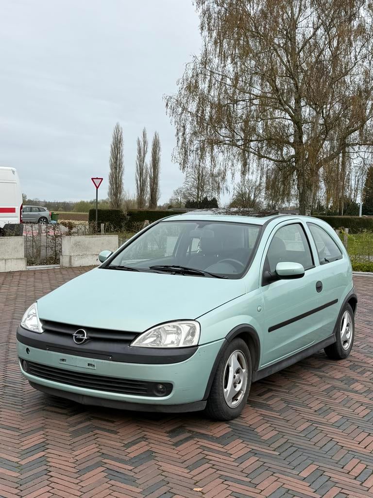 Opel corsa 1.2 benzine opendak gekeurd vvk, Auto's, Voorwielaandrijving, Stof, Elektrische ramen, Overige kleuren