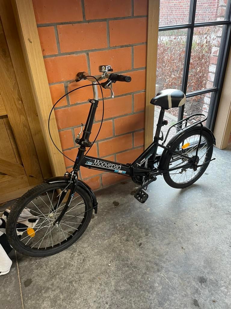 Plooifiets met werk aan, Ophalen