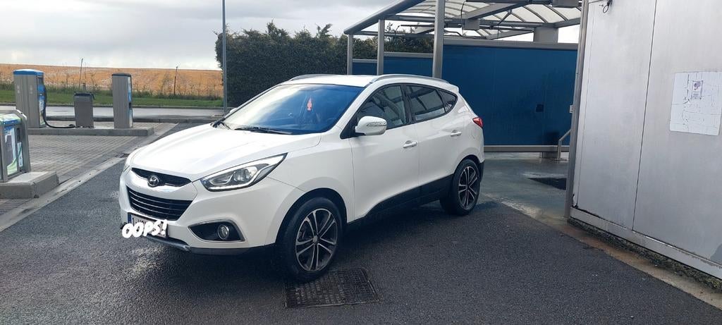 Hyundai ix35 diesel phase 2 avec feux led, Auto's, Voorwielaandrijving, Zwart, Leder en Stof, Wit