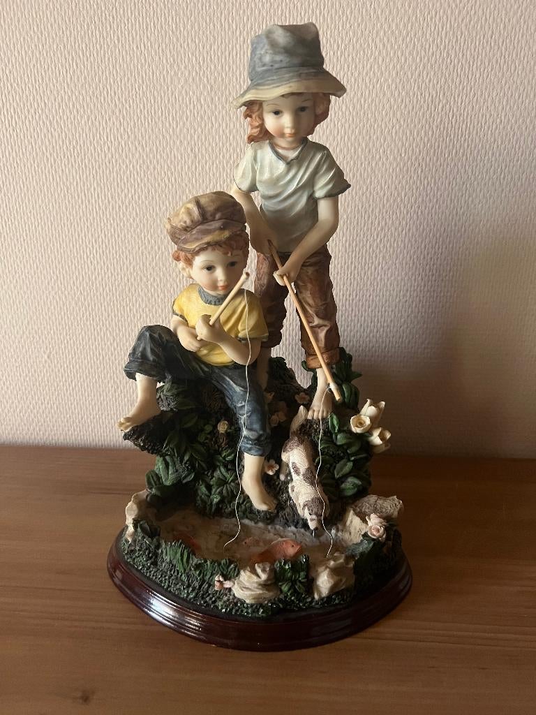 Beeld 2 vissende kinderen, Ophalen